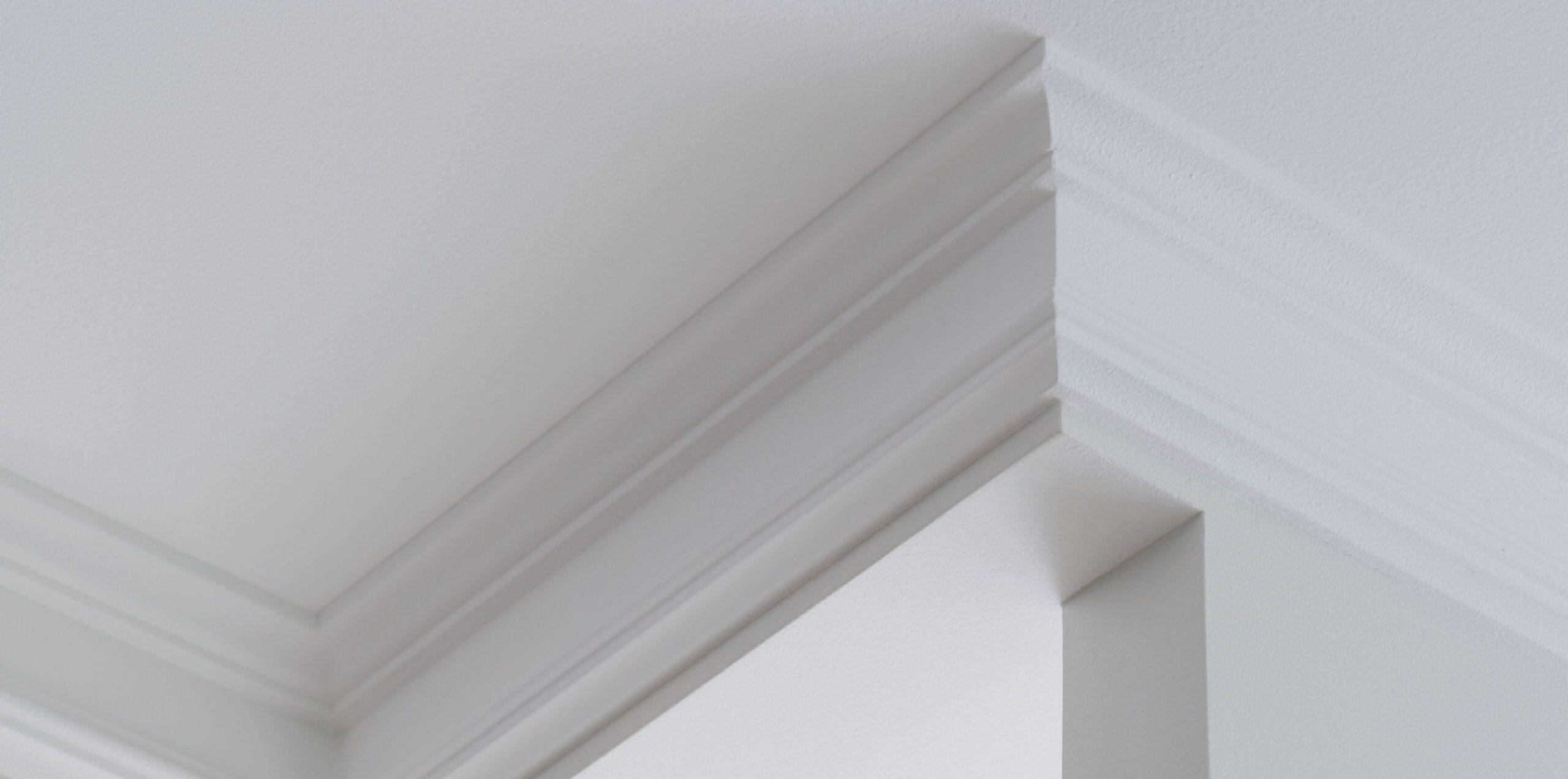 white cornice of a cieling house